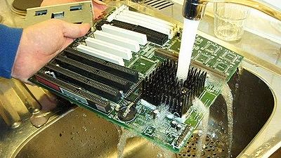 Janitor cleaning motherboard.jpg
